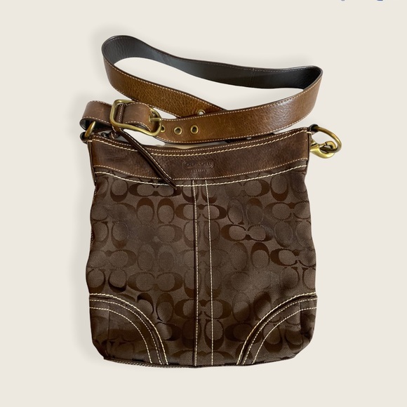 Coach Handbags - Coach Brown Signature
Logo Canvas Convertible Shoulder Bag
Purse